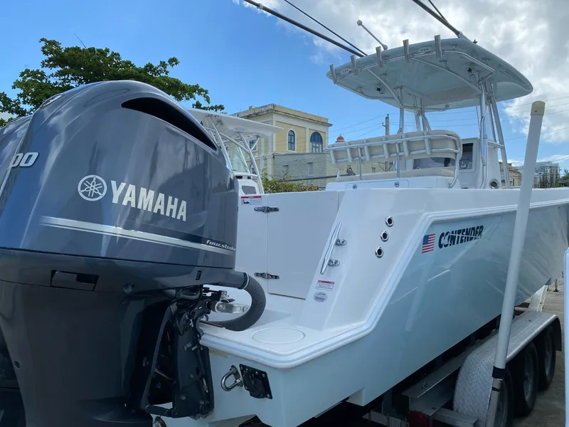 Slide: The Image of 2017 Contender 35 Tournament boat with Yamaha engine on trailer. - 7