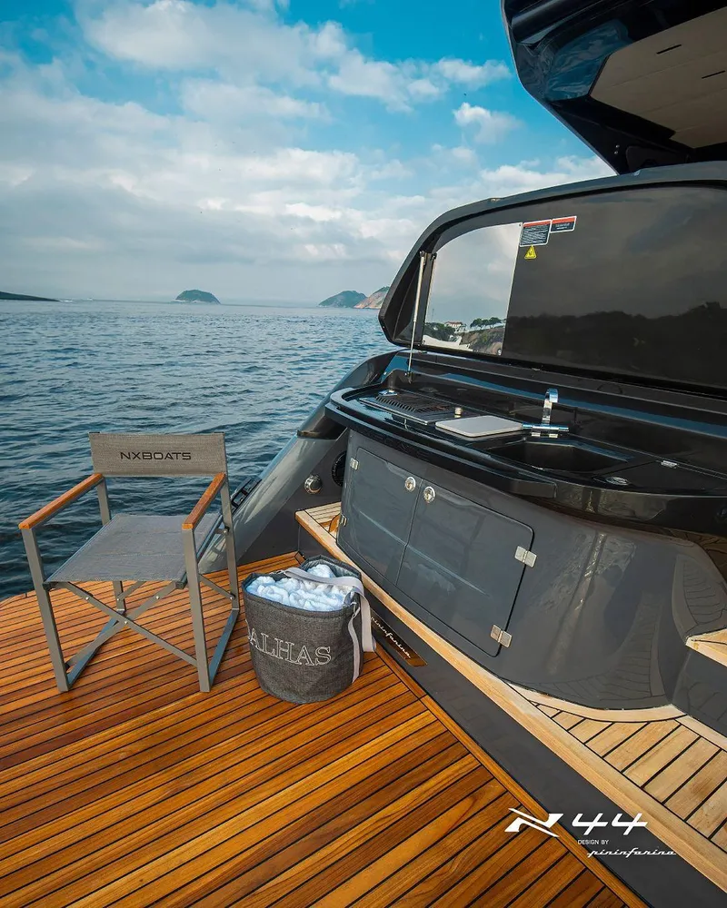 Slide: The Image of Luxury NX44 Pininfarina yacht deck with chair and ocean view, 2025 model. - 10