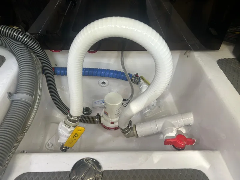 Slide: The Image of Boat plumbing system with hoses and valves, Tides 27, 1996 model. - 9