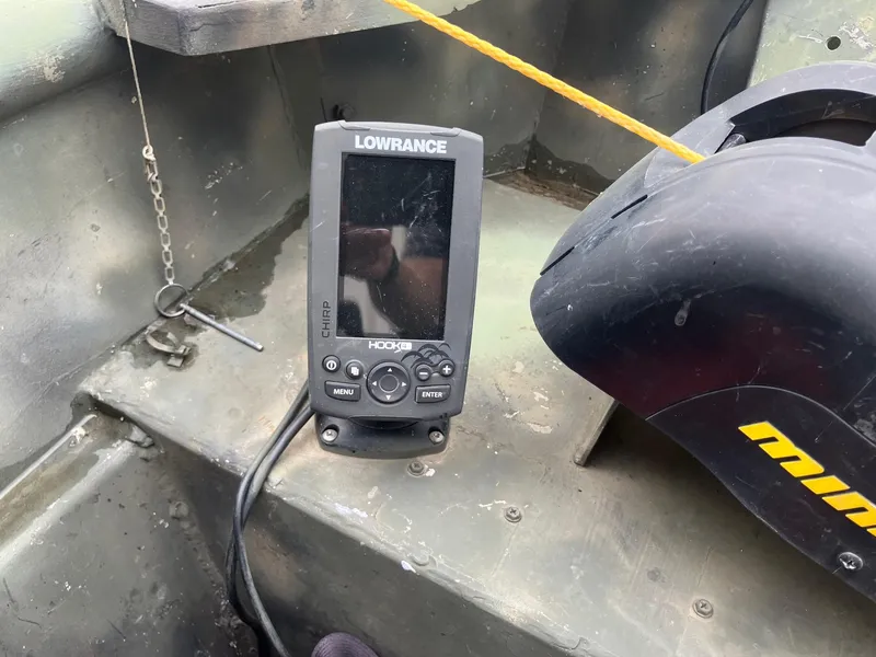 Slide: The Image of Fishfinder device on a Steven Custom JON EXTRA WIDE boat, 2012 model. - 11