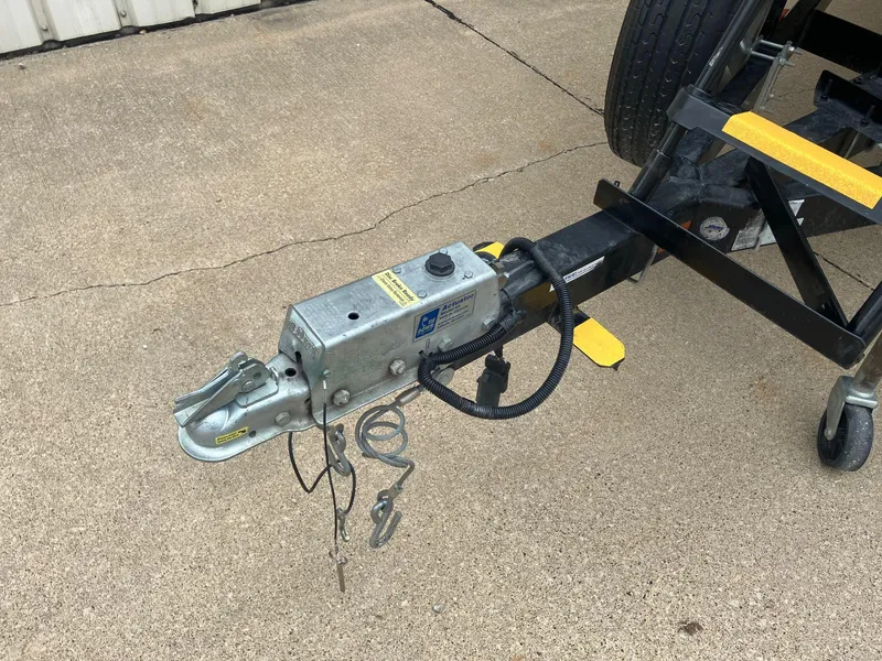 Slide: The Image of Trailer hitch of a 2012 Steven Custom JON EXTRA WIDE on concrete surface. - 25