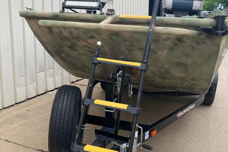 Slide: The Image of Camouflage boat on trailer with ladder, Steven Custom JON EXTRA WIDE, 2012 model. - 33