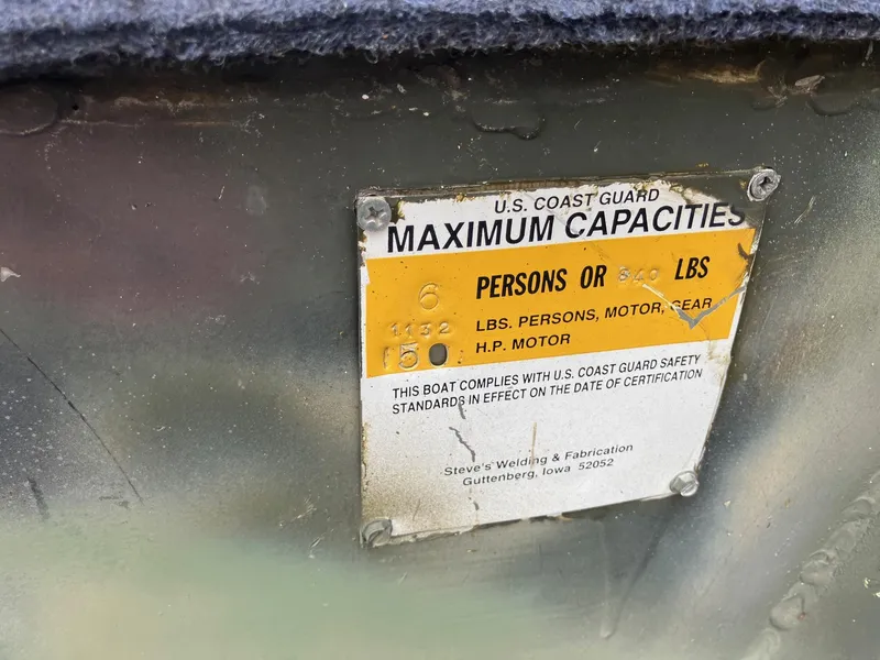 Slide: The Image of Boat capacity label showing U.S. Coast Guard maximum limits for Steven Custom JON EXTRA WIDE, 2012. - 7