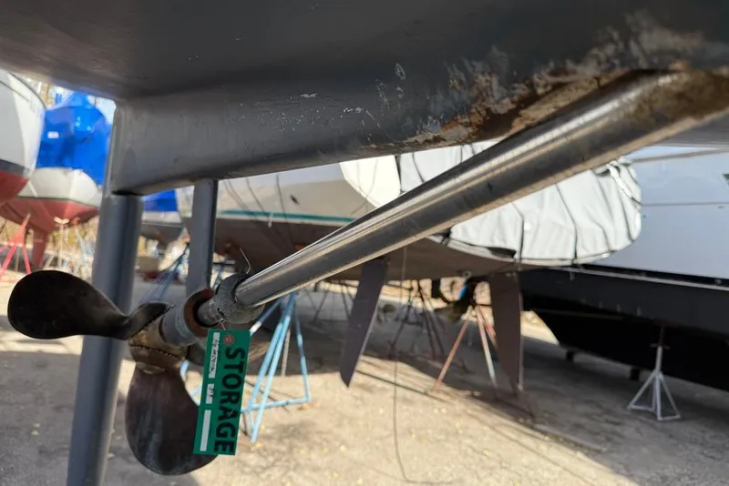 Slide: The Image of Close-up of a 1998 Catalina 42Mk 2 sailboat propeller in storage. - 26