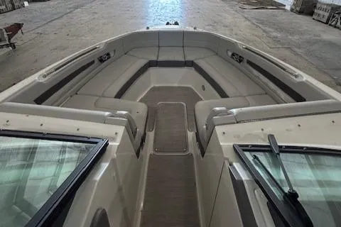 Slide: The Image of 2021 Sea Ray SLX 310 boat interior with spacious seating and sleek design. - 11