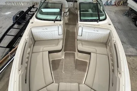 Slide: The Image of 2021 Sea Ray SLX 310 boat with spacious seating and elegant design. - 15