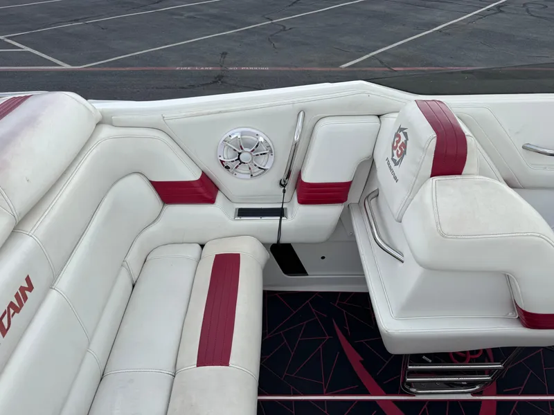Slide: The Image of 2004 Fountain 35 Executioner boat interior with white and red seating. - 10