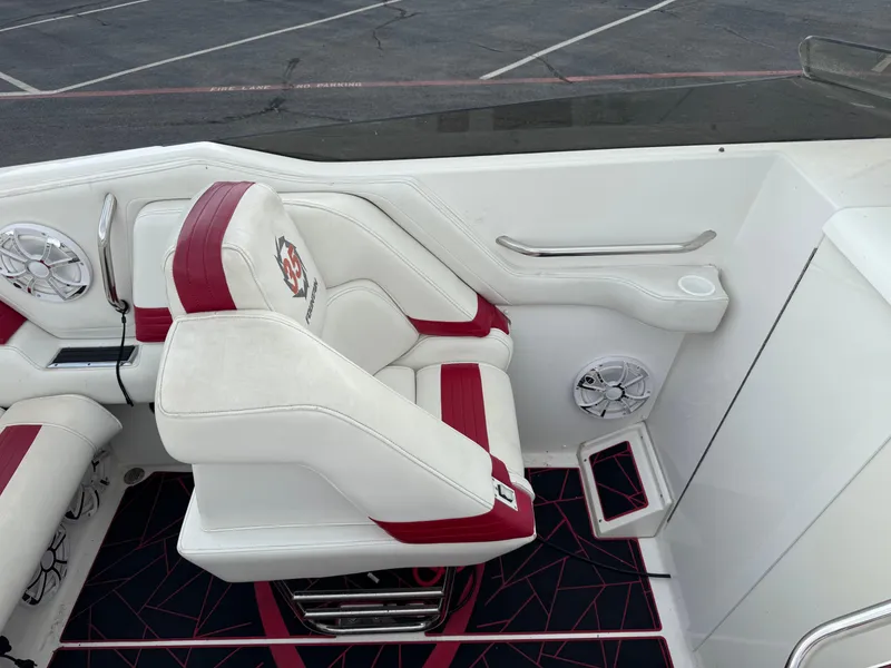 Slide: The Image of Interior of 2004 Fountain 35 Executioner boat with white and red seating. - 7