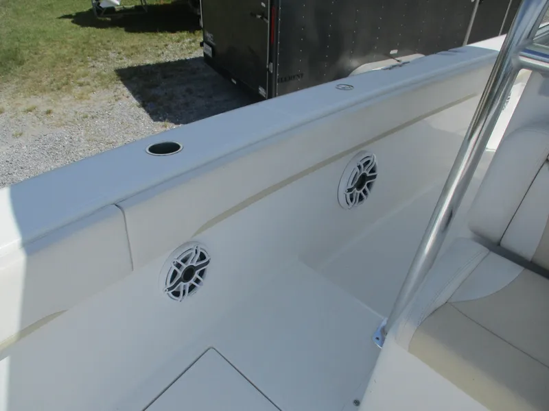 Slide: The Image of 2024 Bluewater 2850 boat interior with speakers and seating, showcasing modern design. - 20