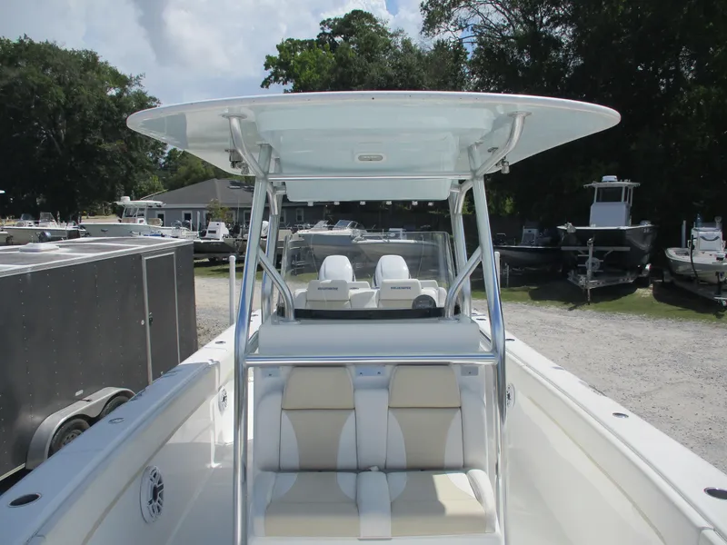 Slide: The Image of 2024 Bluewater 2850 boat with sleek design and spacious seating. - 22