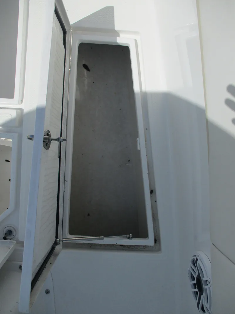 Slide: The Image of Open storage compartment on 2024 Bluewater 2850 boat. - 23