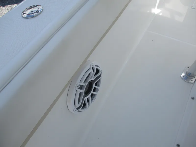 Slide: The Image of 2024 Bluewater 2850 boat deck with speaker and metal fixture. - 26