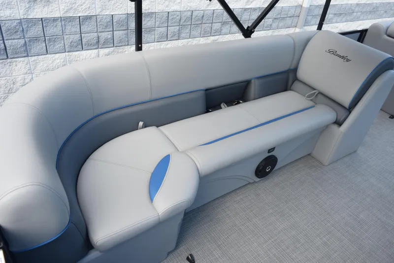 Slide: The Image of 2026 Bentley Pontoons Bolt interior with sleek gray and blue seating design. - 10