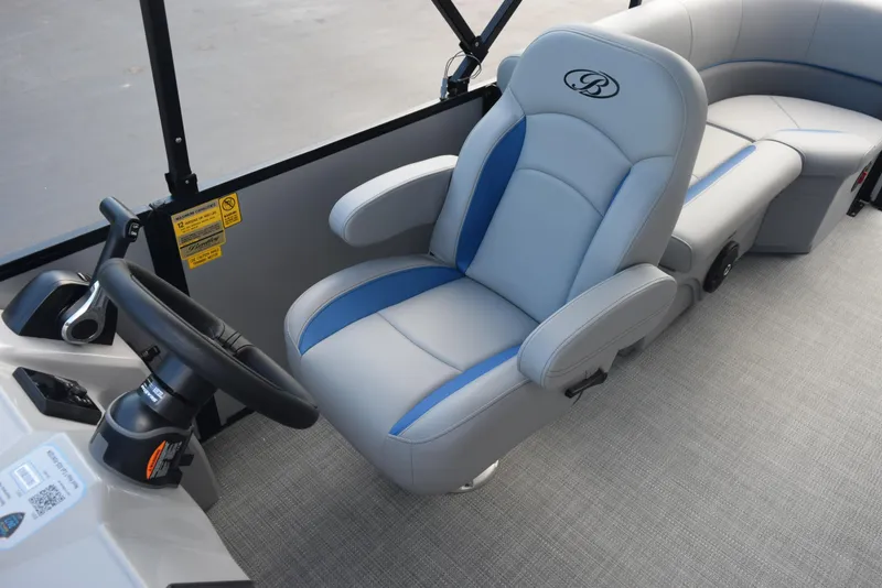 Slide: The Image of 2026 Bentley Pontoons Bolt interior with luxurious seating and steering wheel. - 12