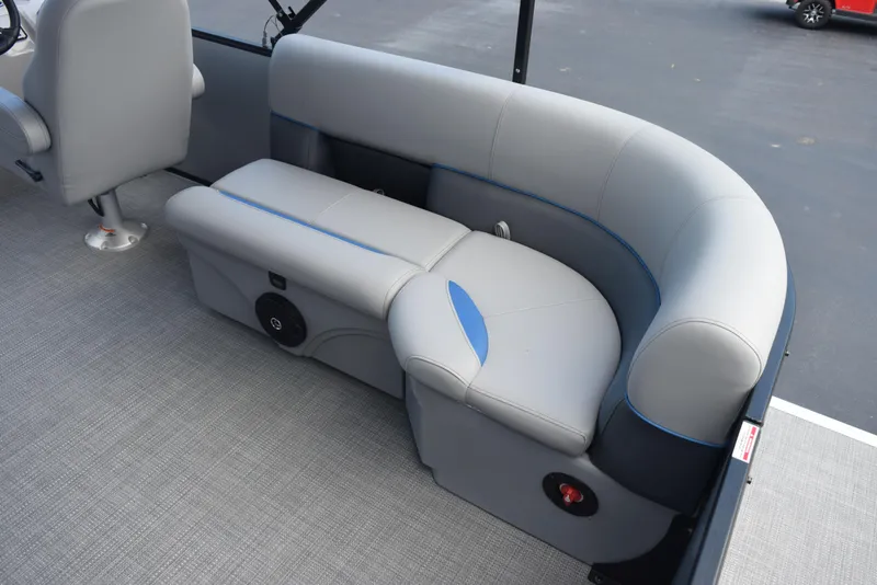 Slide: The Image of 2026 Bentley Pontoons Bolt interior seating with gray upholstery and blue accents. - 9
