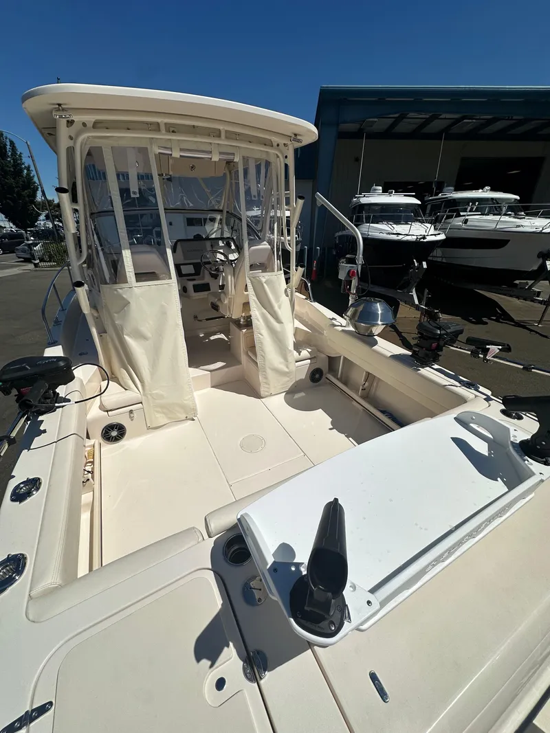 Slide: The Image of 2024 Grady-White 232 Gulfstream boat interior, featuring spacious deck and modern controls. - 3