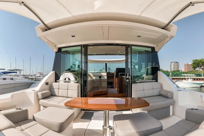 Slide: The Image of 2017 Tiara Yachts C44 Coupe with spacious seating and elegant interior design. - 41