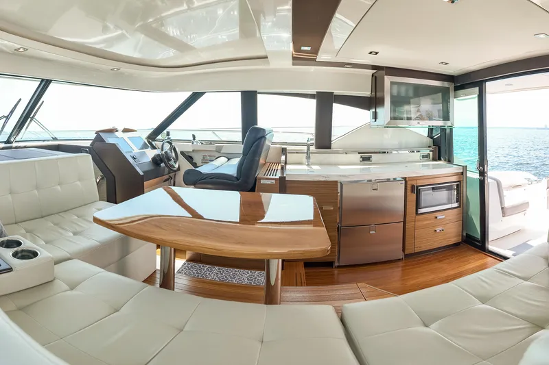 Slide: The Image of Luxurious interior of 2017 Tiara Yachts C44 Coupe with modern amenities and ocean view. - 49
