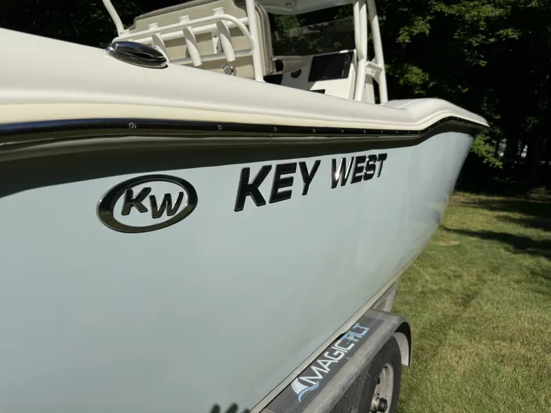 Slide: The Image of 2023 Key West 263 FS boat on trailer, side view with logo. - 4