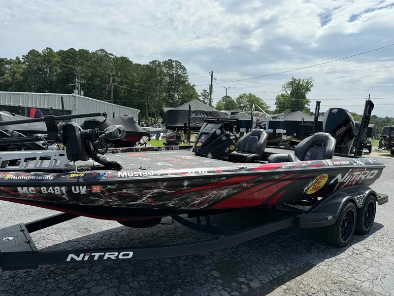 Slide: The Image of 2023 Nitro Z21 XL Pro bass boat on trailer, featuring sleek design and modern equipment. - 0