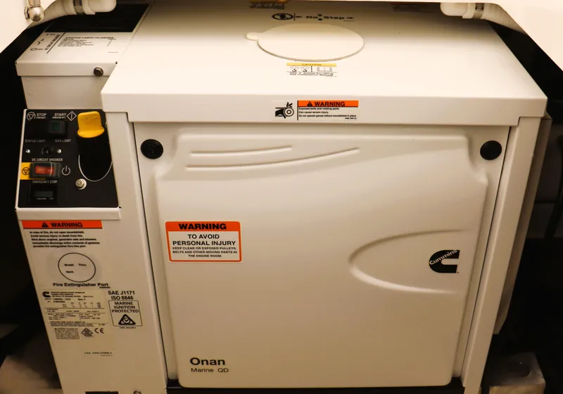 Slide: The Image of Cummins Onan Marine QD generator in a 2020 Back Cove 34O boat engine room. - 34