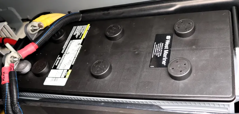 Slide: The Image of Battery compartment of a 2020 Back Cove 34O boat with West Marine battery. - 36