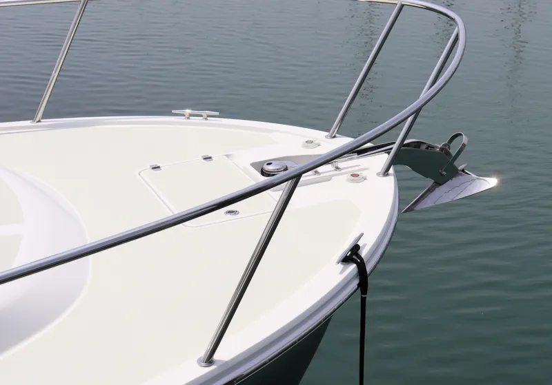 Slide: The Image of Bow of 2020 Back Cove 34O boat with anchor, on calm water. - 38