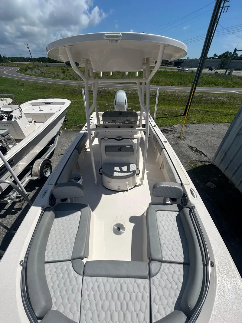 Slide: The Image of 2025 Carolina Skiff 21 Ultra Elite boat with spacious seating and modern design. - 2