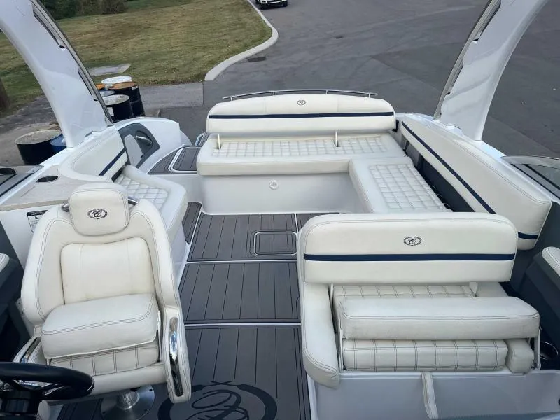 Slide: The Image of 2021 Cobalt R7 boat interior with white seating and sleek design. - 9
