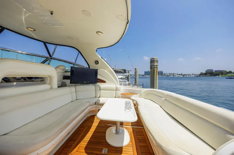 Slide: The Image of Luxurious 2000 Sea Ray 510 Sundancer yacht interior with plush seating and waterfront view. - 20