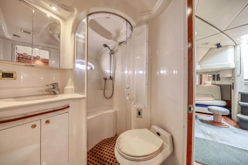 Slide: The Image of Luxurious bathroom interior of 2000 Sea Ray 510 Sundancer yacht, featuring shower and vanity. - 36