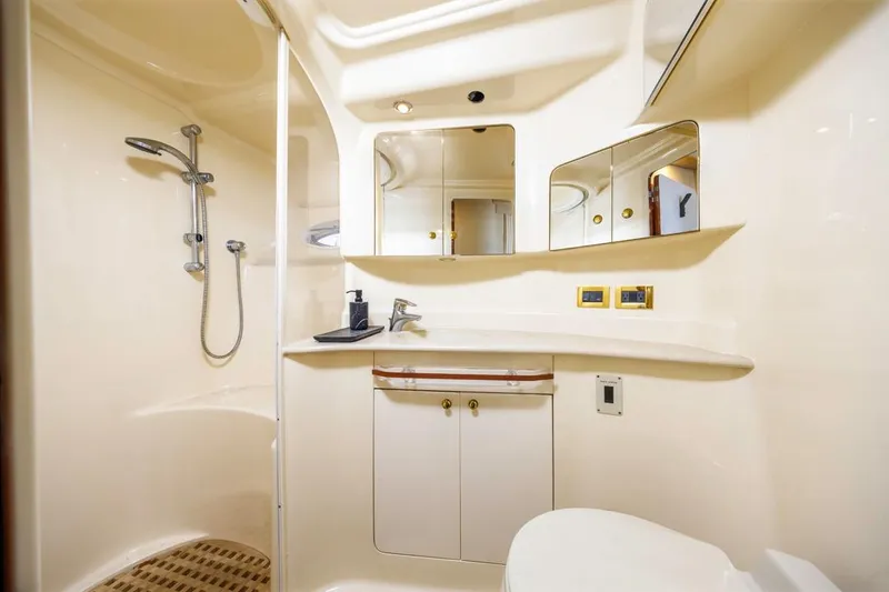 Slide: The Image of Luxurious bathroom interior of 2000 Sea Ray 510 Sundancer yacht with shower and vanity. - 43