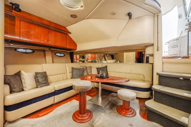 Slide: The Image of Luxurious interior of 2000 Sea Ray 510 Sundancer yacht with plush seating and elegant decor. - 45