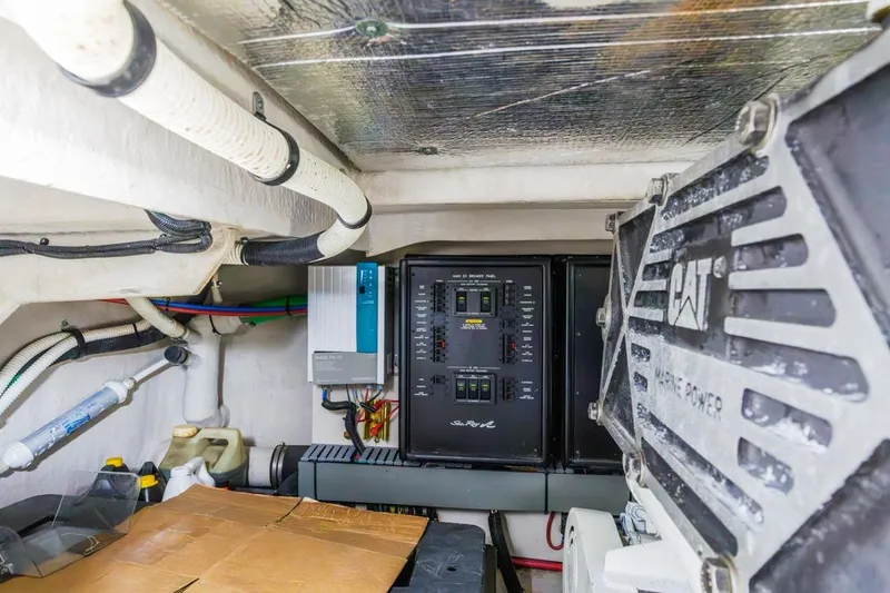 Slide: The Image of Engine room of 2000 Sea Ray 510 Sundancer with CAT marine power system. - 52