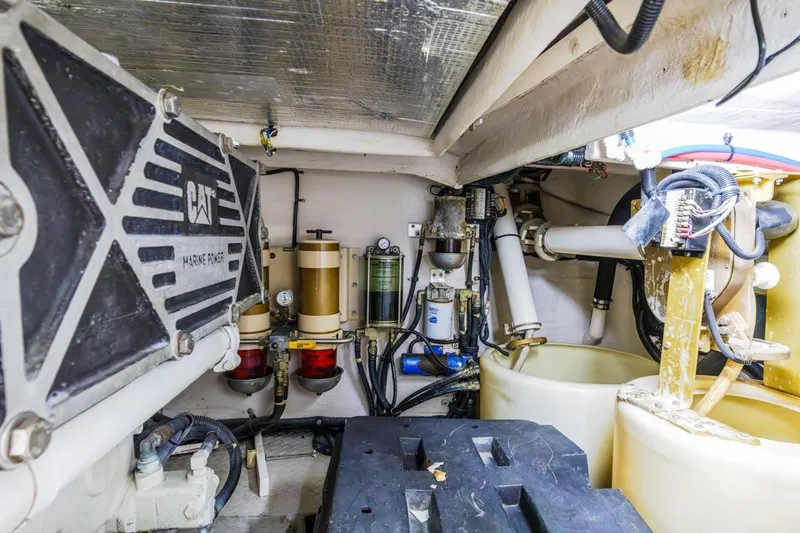 Slide: The Image of Engine room of 2000 Sea Ray 510 Sundancer with CAT marine power components. - 53