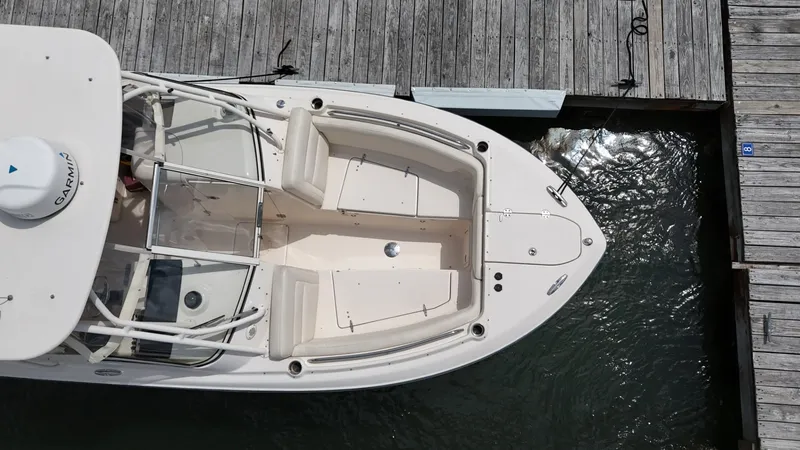 Slide: The Image of Overhead view of 2017 Grady-White Freedom 275 boat docked at a wooden pier. - 4