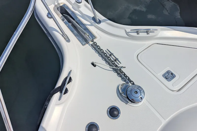 Slide: The Image of Bow deck of 2005 Tiara Yachts 3200 Open with anchor chain and cleats. - 29
