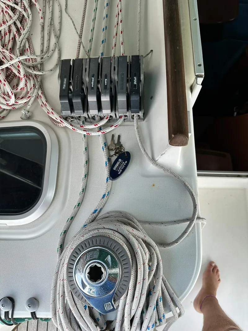 Slide: The Image of Deck of 1998 Beneteau 381 sailboat with winch, ropes, and cleats. - 22