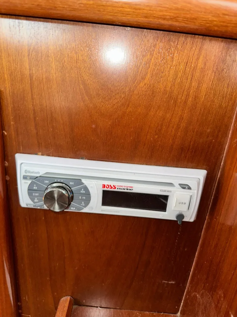 Slide: The Image of Audio system in 1998 Beneteau 381 boat with wooden paneling. - 41