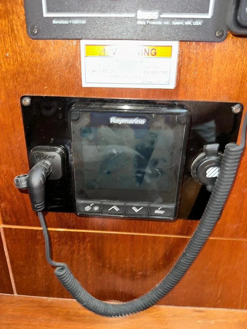 Slide: The Image of Raymarine navigation system on 1998 Beneteau 381 yacht control panel. - 45