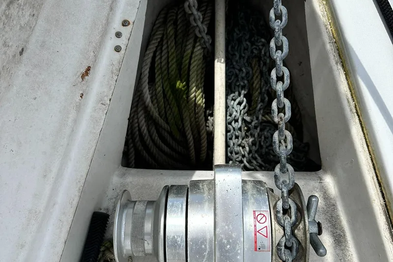 Slide: The Image of Anchor chain and rope storage on a 1998 Beneteau 381 sailboat. - 5