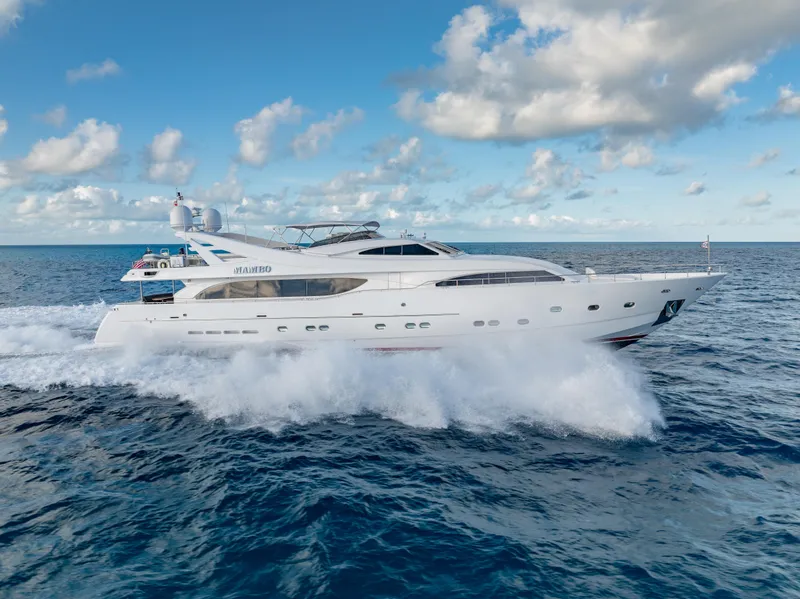 The Image of 2004 Ferretti Yachts 112 Custom Line cruising on open sea under blue sky. - 0