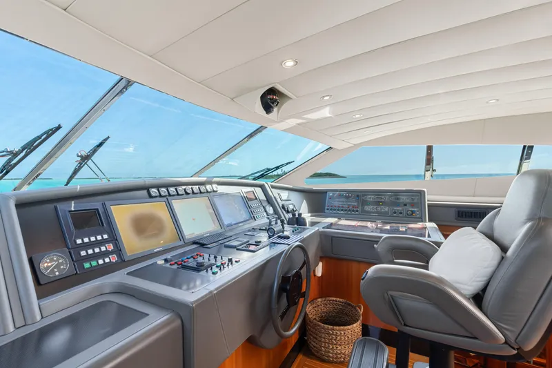 Slide: The Image of Helm of 2004 Ferretti Yachts 112 Custom Line with modern navigation equipment and ocean view. - 25