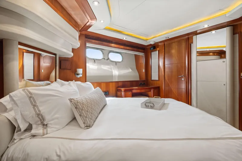 Slide: The Image of Luxurious bedroom interior of 2004 Ferretti Yachts 112 Custom Line, featuring elegant wood finishes. - 37