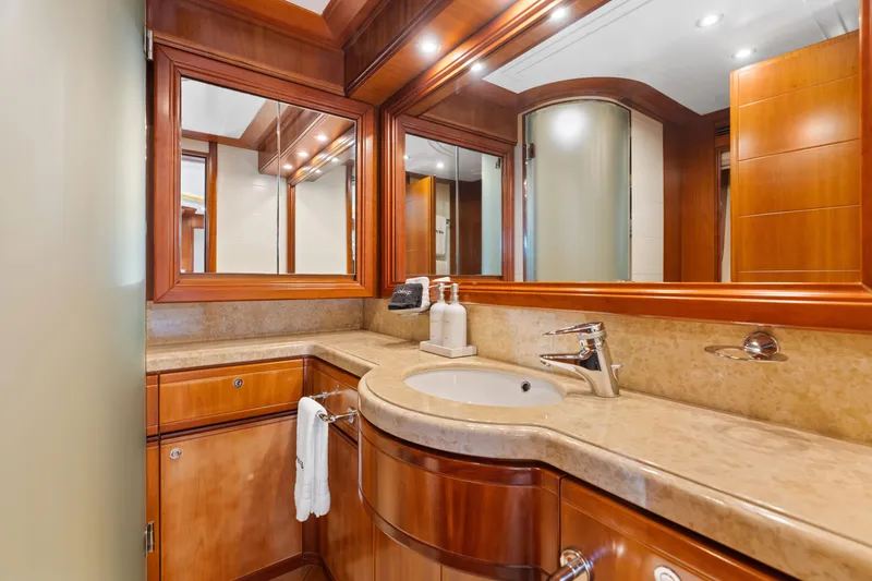 Slide: The Image of Luxurious bathroom in 2004 Ferretti Yachts 112 Custom Line, featuring elegant wood finishes. - 39