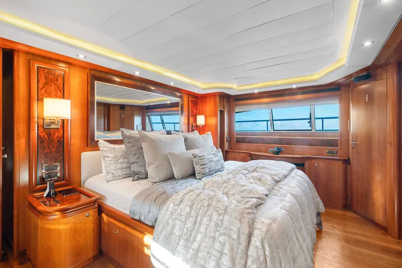 Slide: The Image of Luxurious bedroom interior on 2004 Ferretti Yachts 112 Custom Line, featuring elegant wood finishes. - 48