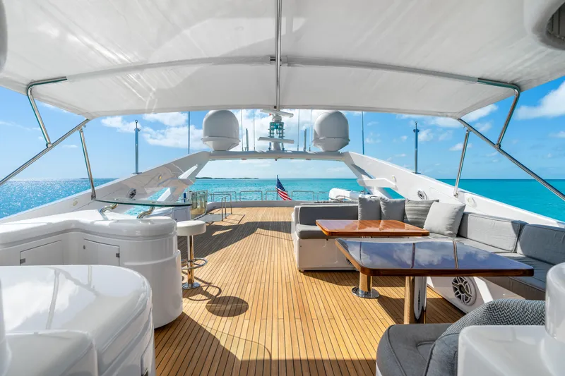 Slide: The Image of Luxurious 2004 Ferretti Yachts 112 Custom Line deck with ocean view and elegant seating. - 10