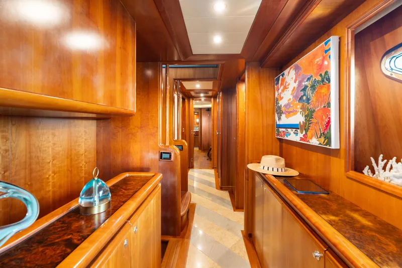 Slide: The Image of Luxurious wooden interior of 2004 Ferretti Yachts 112 Custom Line with vibrant artwork. - 34
