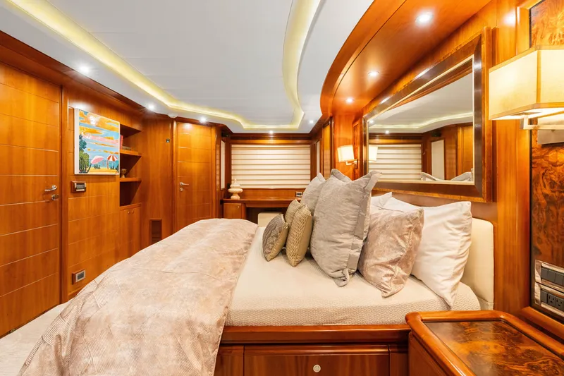 Slide: The Image of Luxurious bedroom interior of 2004 Ferretti Yachts 112 Custom Line, featuring elegant wood finishes. - 45