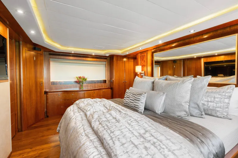 Slide: The Image of Luxurious bedroom interior on 2004 Ferretti Yachts 112 Custom Line, featuring elegant wood finishes. - 49